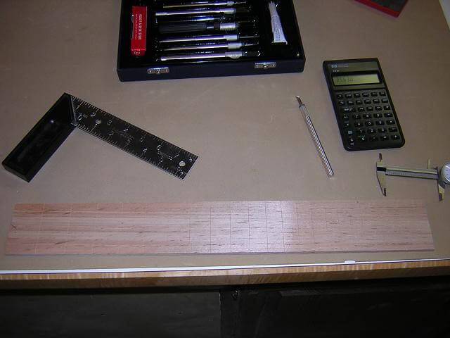 Marking the fret positions.