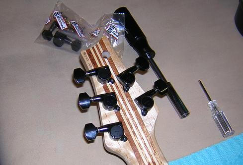 Installing the tuning machines.