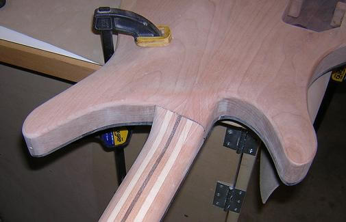 Carving the neck heel.