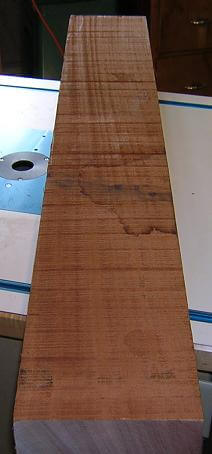 The rough slab of mahogany.