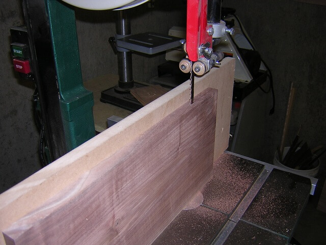 Resawing thicker boards into 1/4 inch pieces that will become the back and front of the guitar.