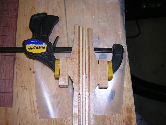 Gluing the ears to the headstock.
