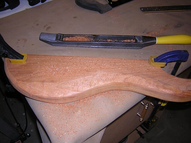 Carving the rear belly cutout.