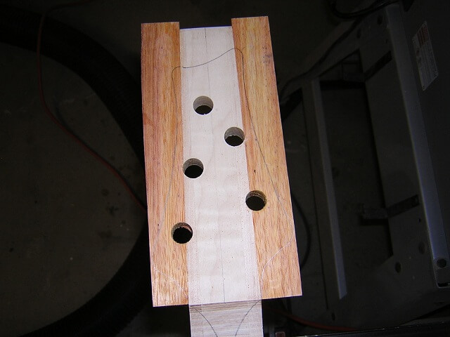 Drilling the holes for the tuning pegs.