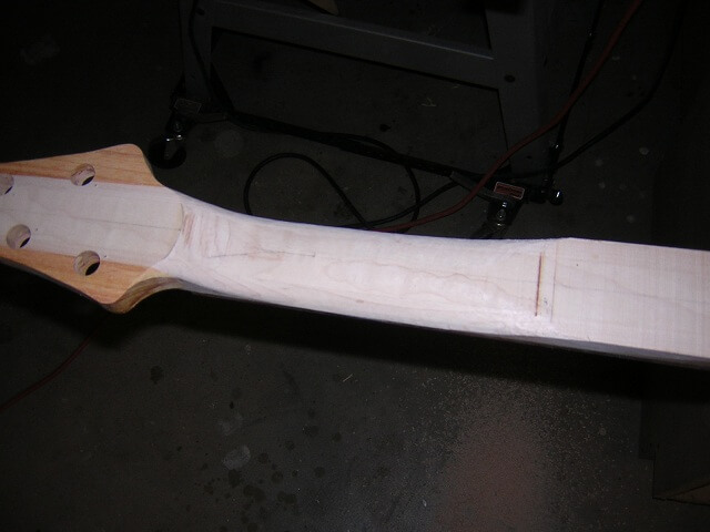 Continuing to carve the neck.