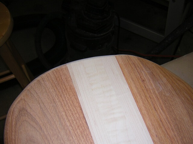 Rounding over the ends of the neck.