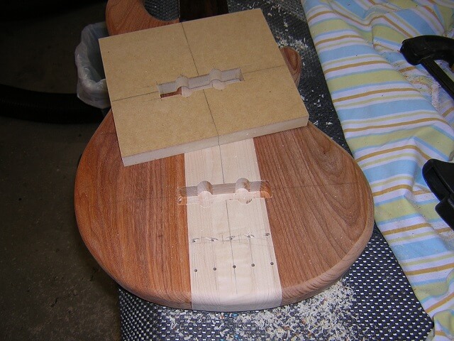 Routing the cavities for the pickups.