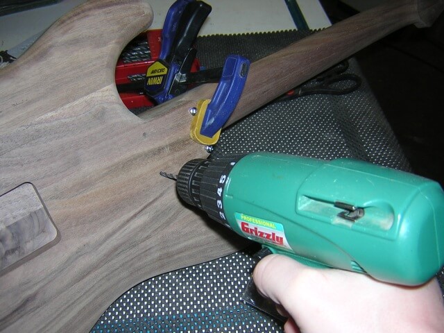Drilling the neck bolt holes.