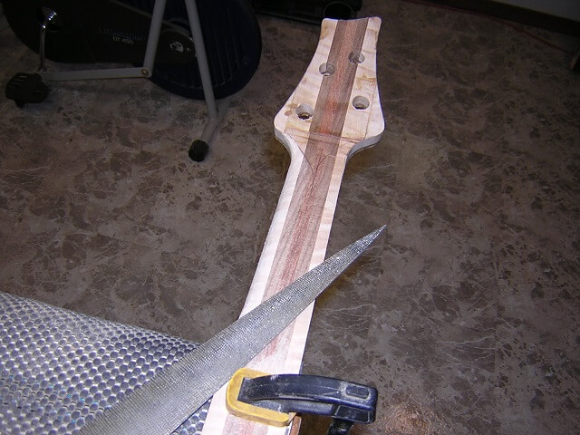 Starting the carve on the nut side of the neck.