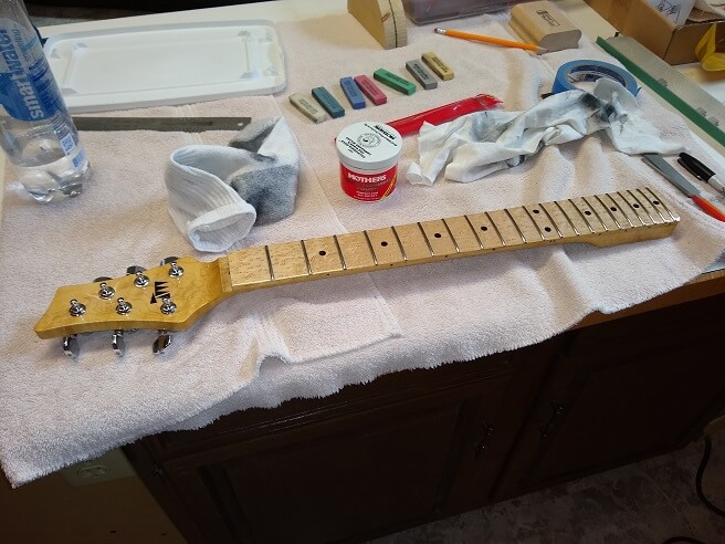 Frets crowned and polished.