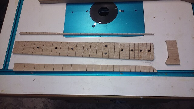 Rough cutting the fretboard to shape.