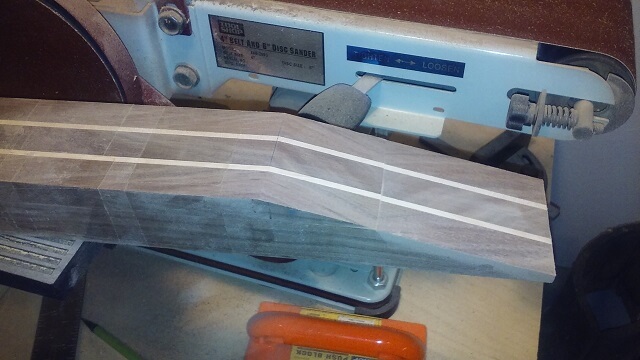 Smoothing the glue joint area for the scarf joint.