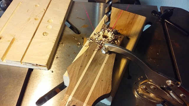 Drilling the tuner holes.