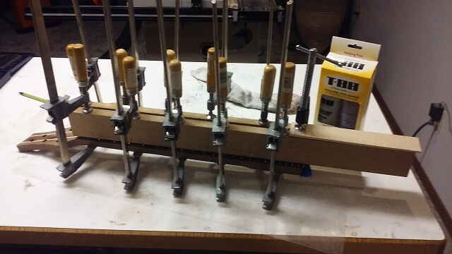 Gluing the fretboard to the neck.