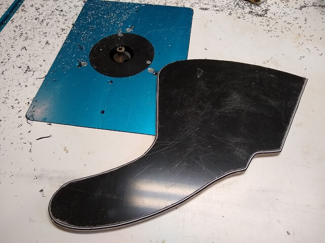 The pickguard routed flush to the template.