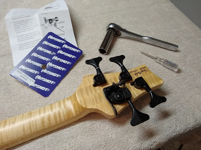 Installing the tuning machines.