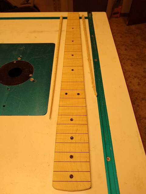Rough cutting the fretboard to shape.