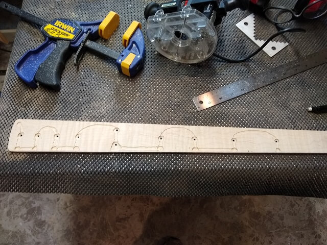 Routing the back of the fretboard for the LEDs.