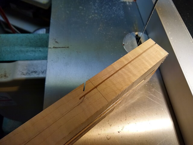 Cutting the bottom of the neck heel.