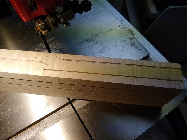 Cutting the straight parts of the headstock.