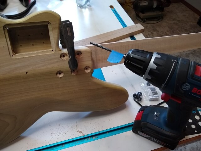 Drilling the holes for the neck screws.