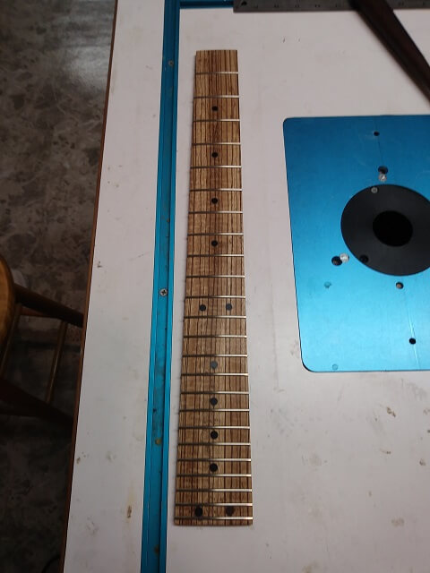 The fretboard is complete. Or is it?