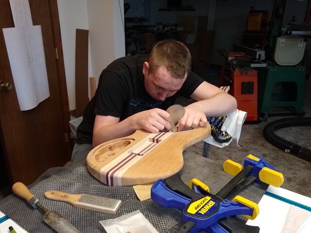 Carving the neck.