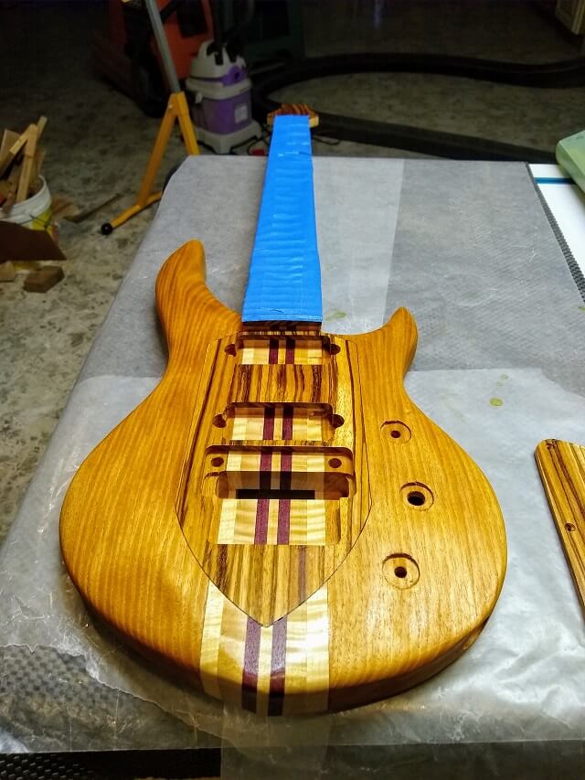 The whole guitar coated in schellac.