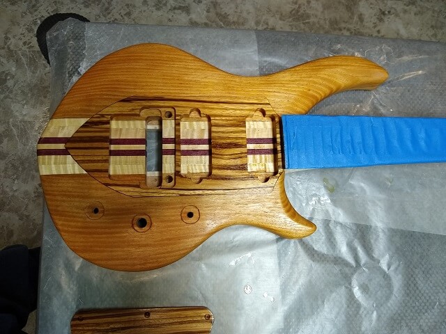 The whole guitar coated in schellac.