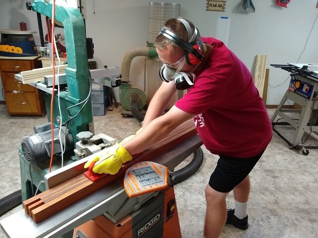 Jointing the face of the neck blank flat.