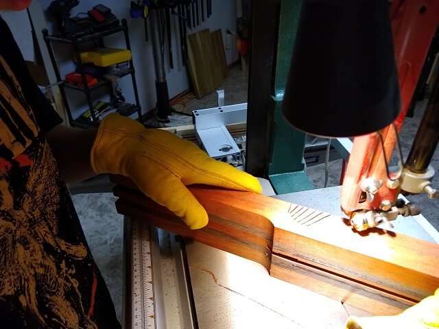 Making relief cuts in the nut end of the neck.