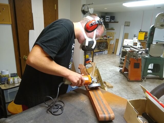 Starting to carve the back of the neck with the angle grinder.