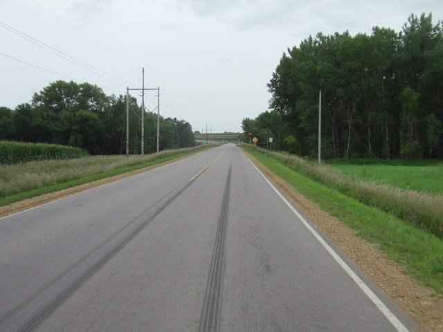 Crossing the border into Iowa on a one lane bridge.