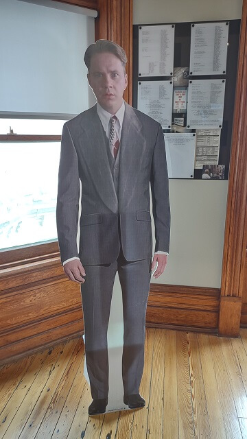 A cardboard cutout of Andy Dusfrene from the Shawshank Redemption movie.
