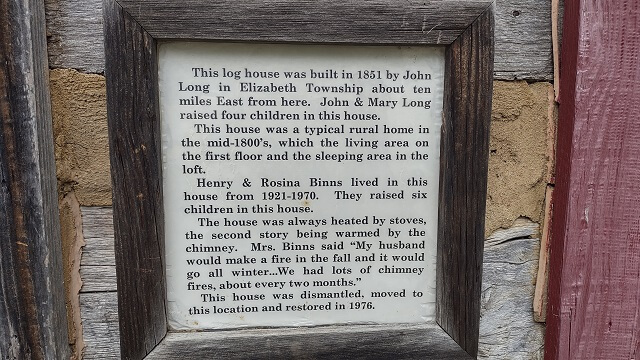 A plaque talking about the log cabin in Galena, IL.
