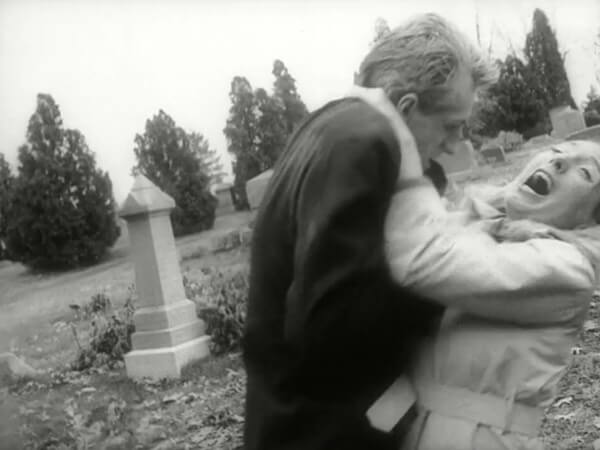 The scene from Night of the Living Dead with the same grave marker in it.