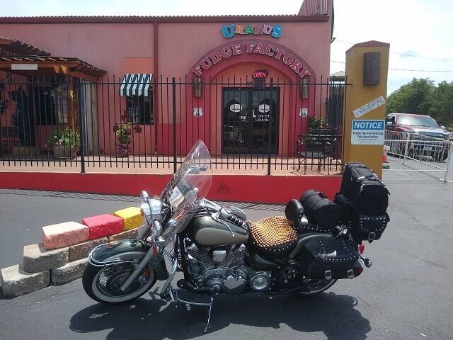My motorcycle outside the Uranus Fudge Factory.