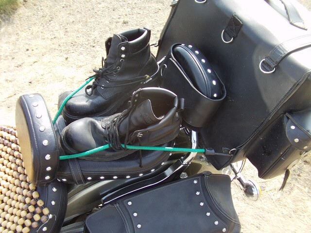 Tying my boots to the back seat.
