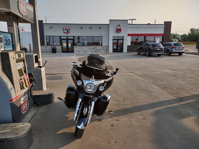 Filling up the motorcycle with gas at Oacoma, SD.