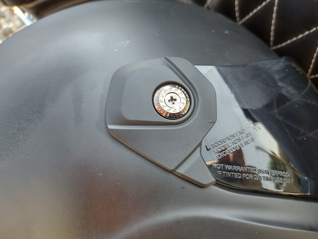 Helmet visor screw came loose.