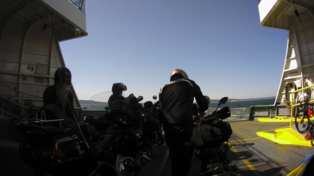 Parking the motorcycles on the ferry.