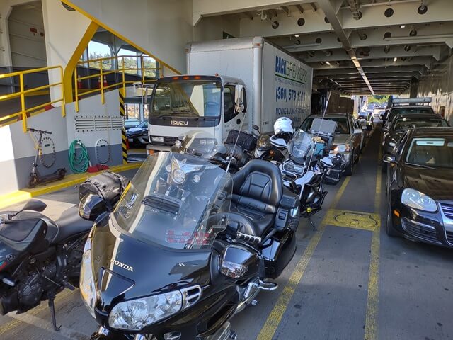 The line of motorcycles parked on the ferry.