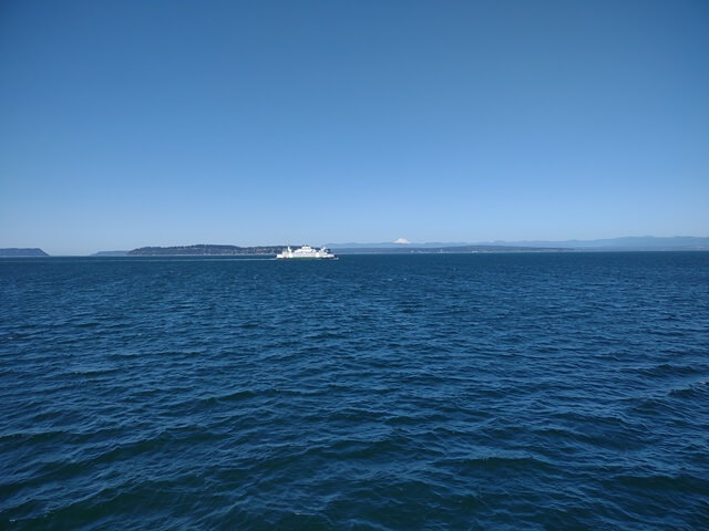 The other ferry crossing in the opposite direction.