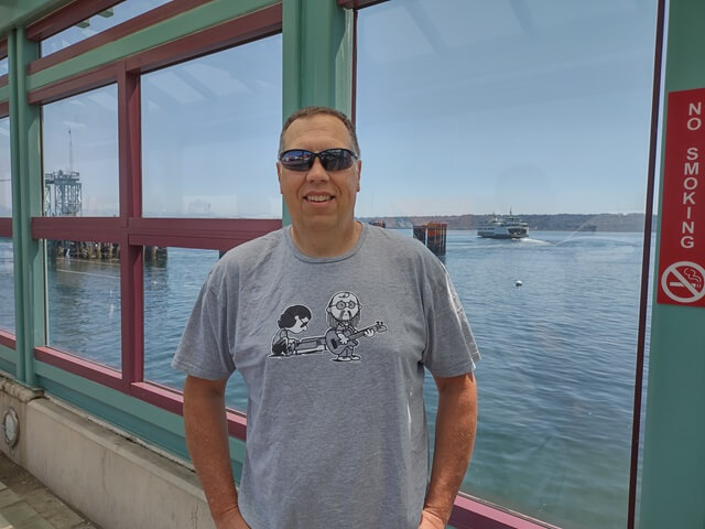 Shawn wanted to take a picture of me. The ferry is leaving in the background.