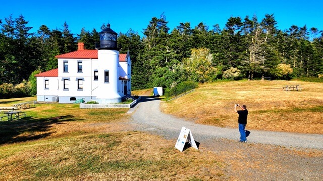 Me taking a picture of the Admiralty Head Lighthouse at Fort Casey on Whidbey Island.