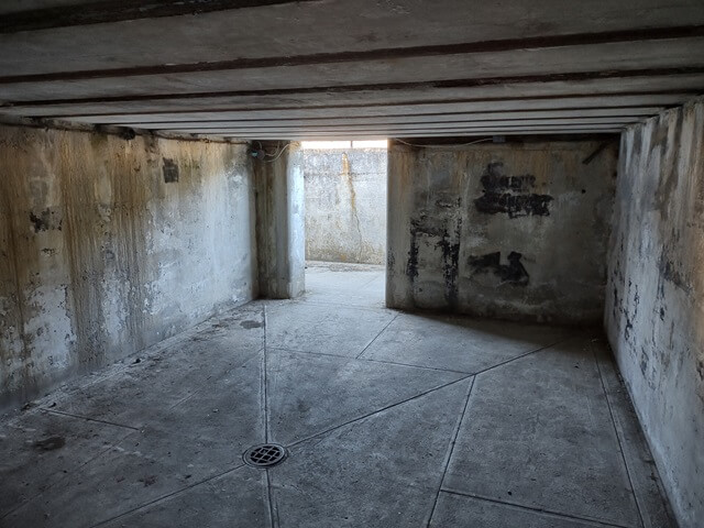 A concrete room underneath Battery Turman at Fort Casey state park.