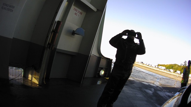 Me taking a picture of my motorcycle after riding onto the ferry.