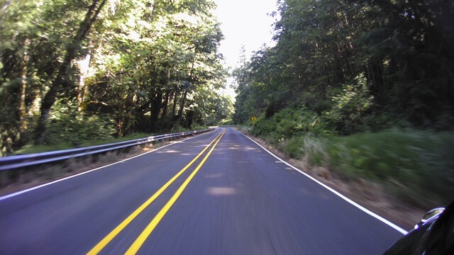 Riding west on highway 101 between Port Discovery, WA and Port Angeles, WA.