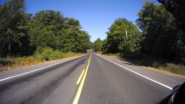 Riding west on highway 101 between Port Discovery, WA and Port Angeles, WA.