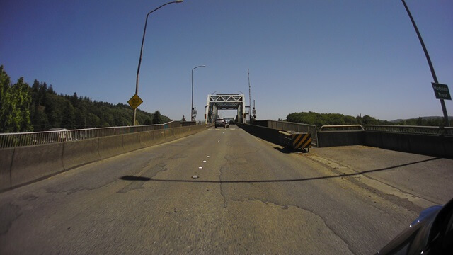 Crossing a metal grate bridge in Aberdeen, WA.